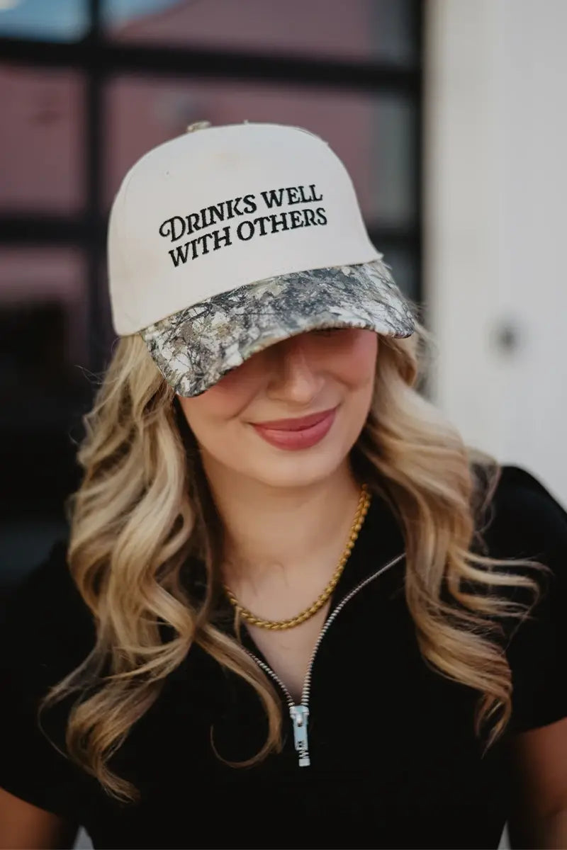 Drinks Well With Others Trucker Hat