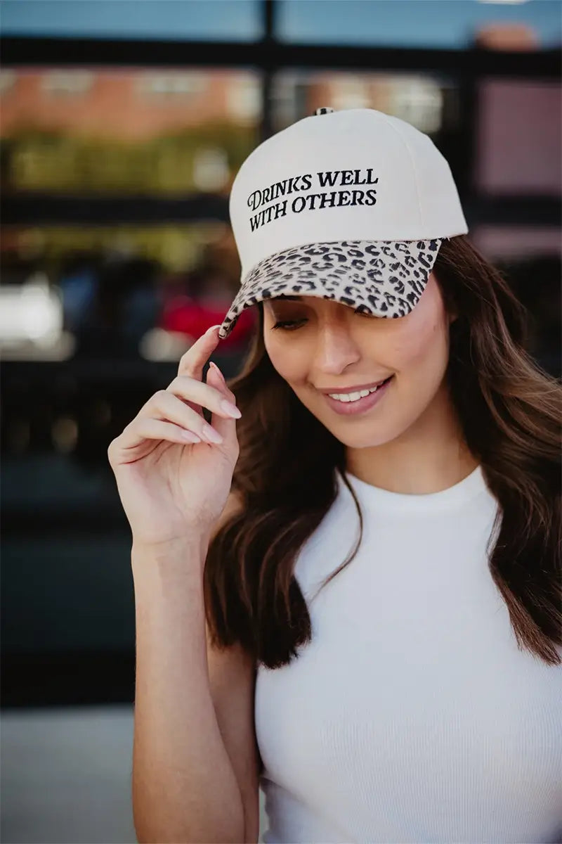 Drinks Well With Others Trucker Hat