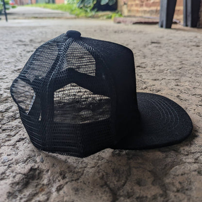 "Raised in a barn" Youth Cow Mesh Trucker Hat