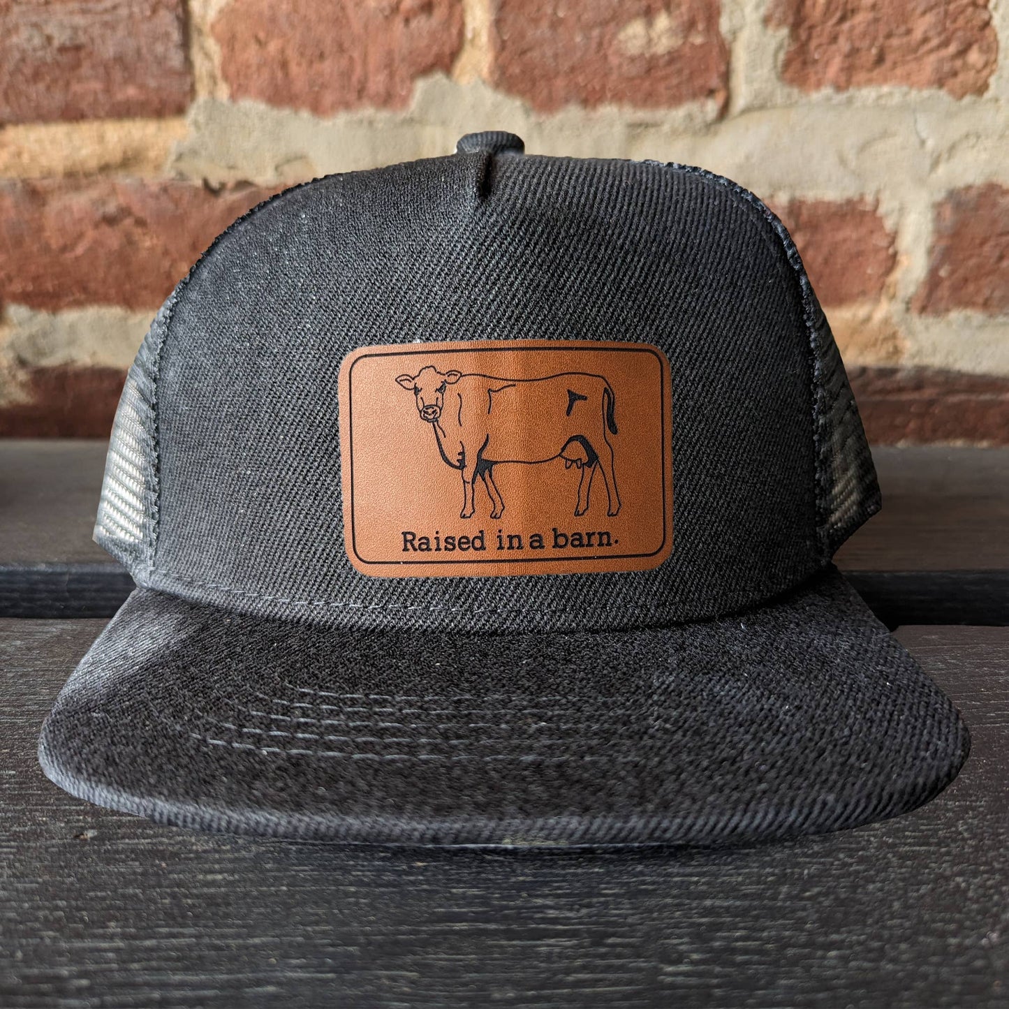 "Raised in a barn" Heather Gray Youth Cow Mesh Trucker Hat